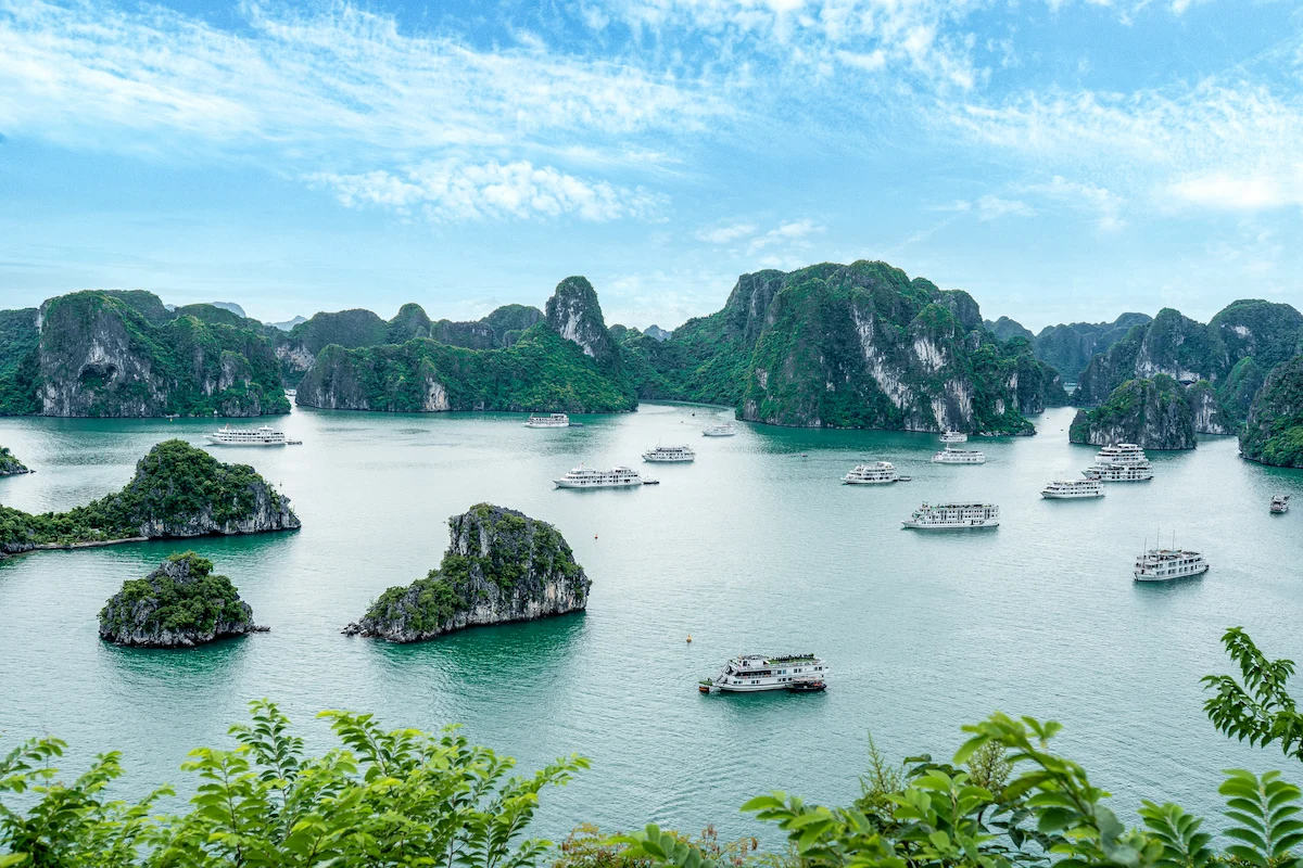 Panoramic view of the vast Halong Bay landscape with many boats