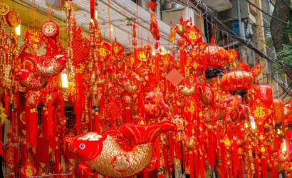 Hanoi Old Quarter walking tour through a colorful traditional decoration street