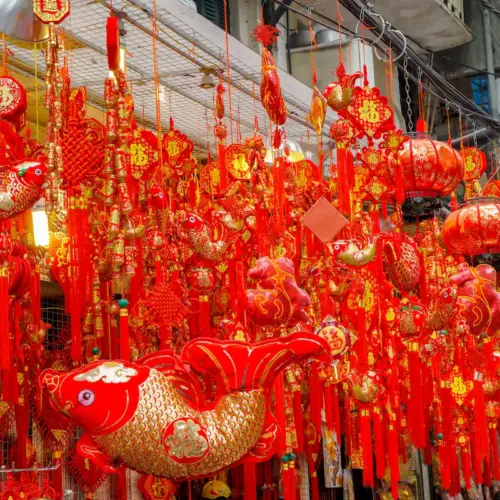 Hanoi Old Quarter walking tour through a colorful traditional decoration street