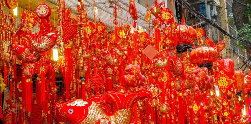 Hanoi Old Quarter walking tour through a colorful traditional decoration street