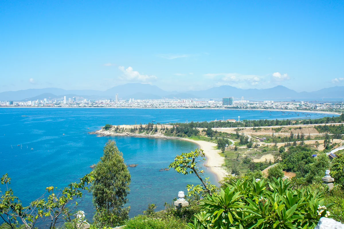 Blue sea and sandy coves along Da Nang's coast from a hillside