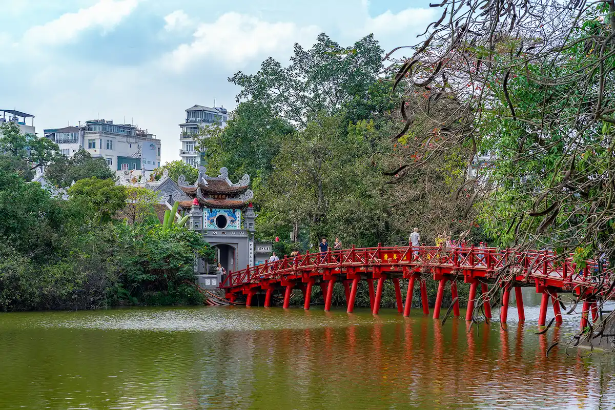 The iconic red The Huc Bridge leading to Ngoc Son Temple in Hanoi